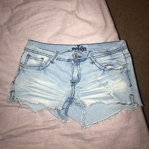 Light blue ripped jean shorts